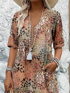 Susana | Vestido midi estampado con bolsillos